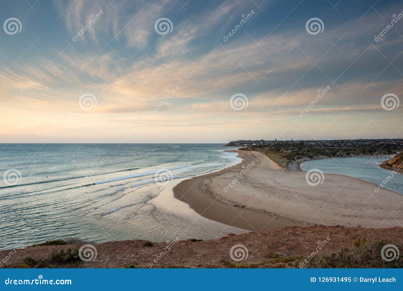 sunset over the onkaparinga river mouth looking north towards th