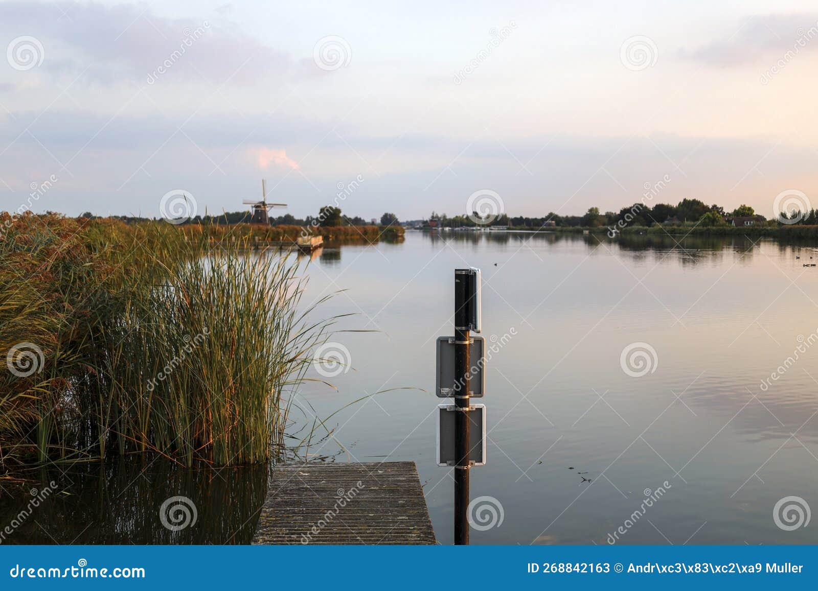 sunset over river rotte at the tweemanspolder in zevenhuizen
