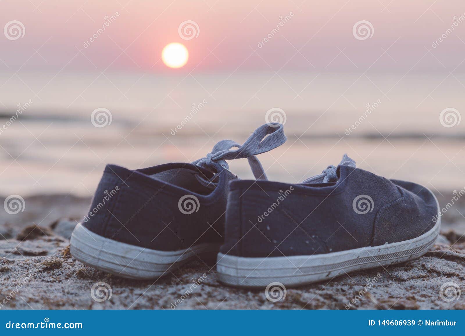 Two sneakers at the beach stock image. Image of sneakers 149606939