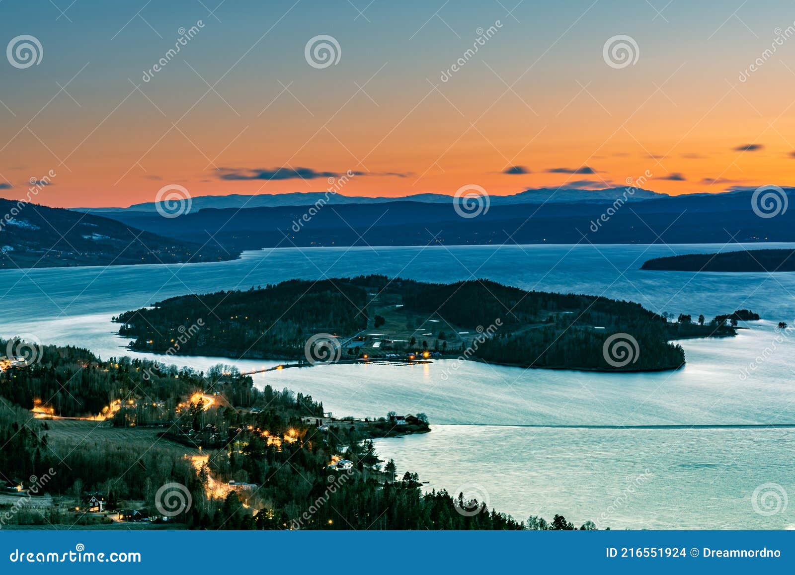 sunset over steinsfjorden, a branch of lake tyrifjorden located in buskerud, norway. view from kongens utsikt royal view at