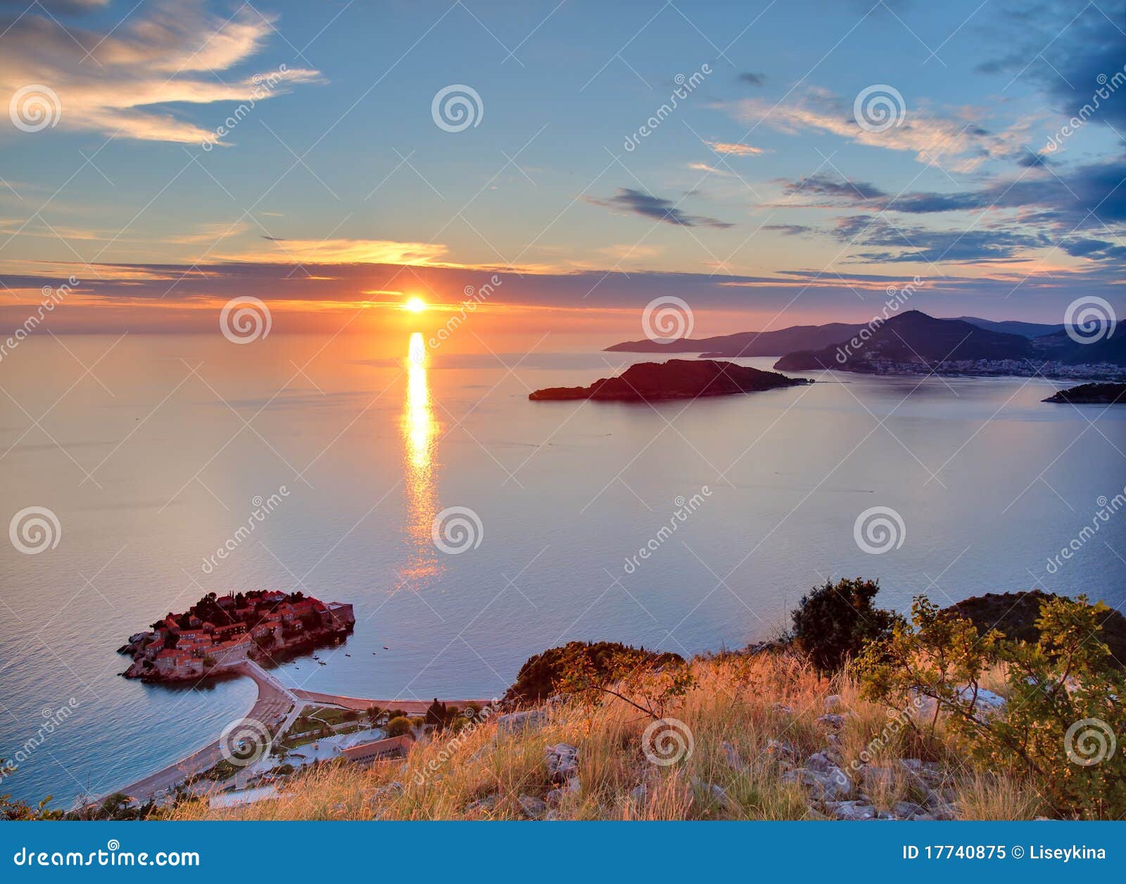 sunset over sveti-stefan in montenegro
