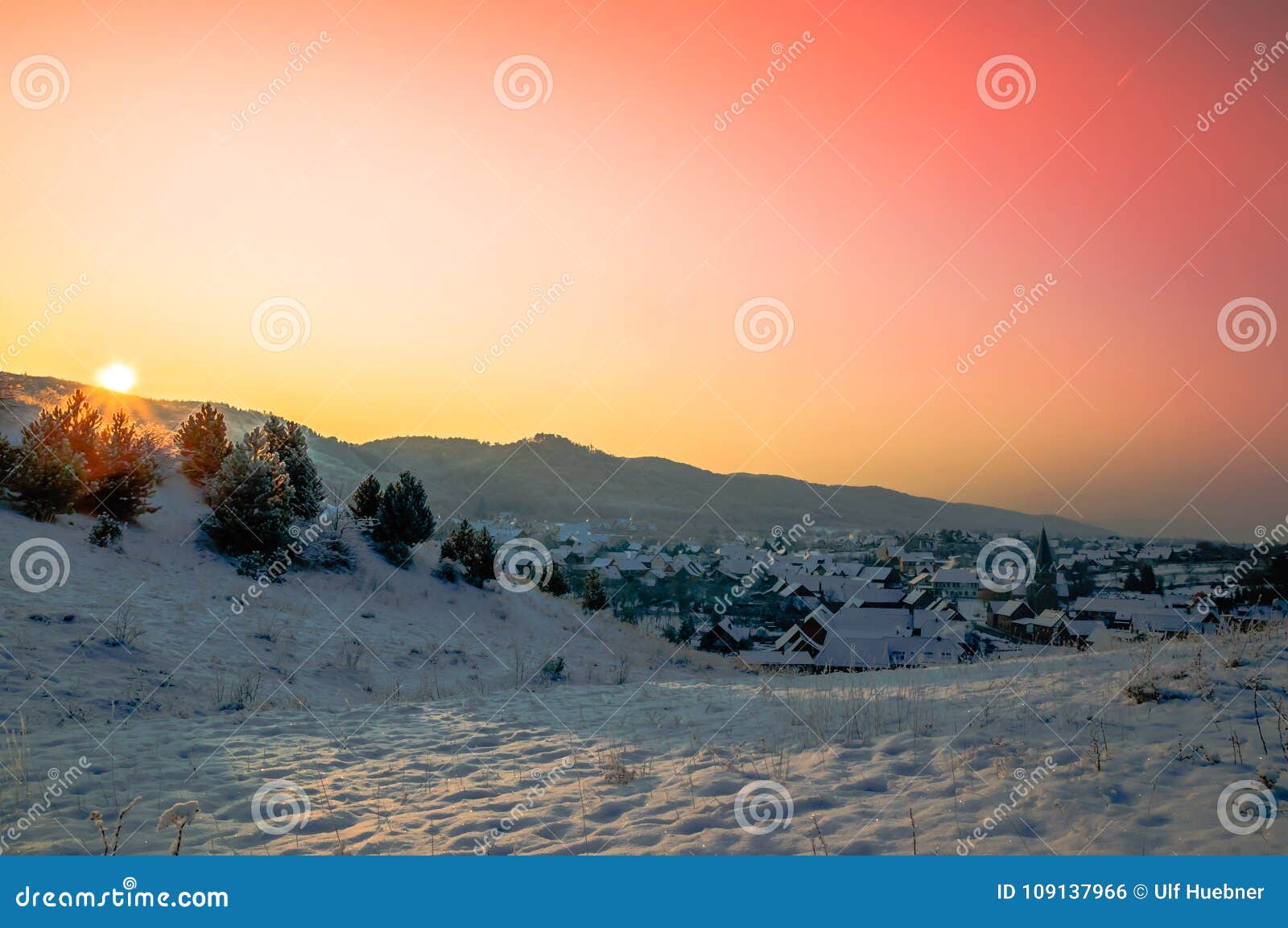 sunset over village of benzingerode in harz mountain - germany