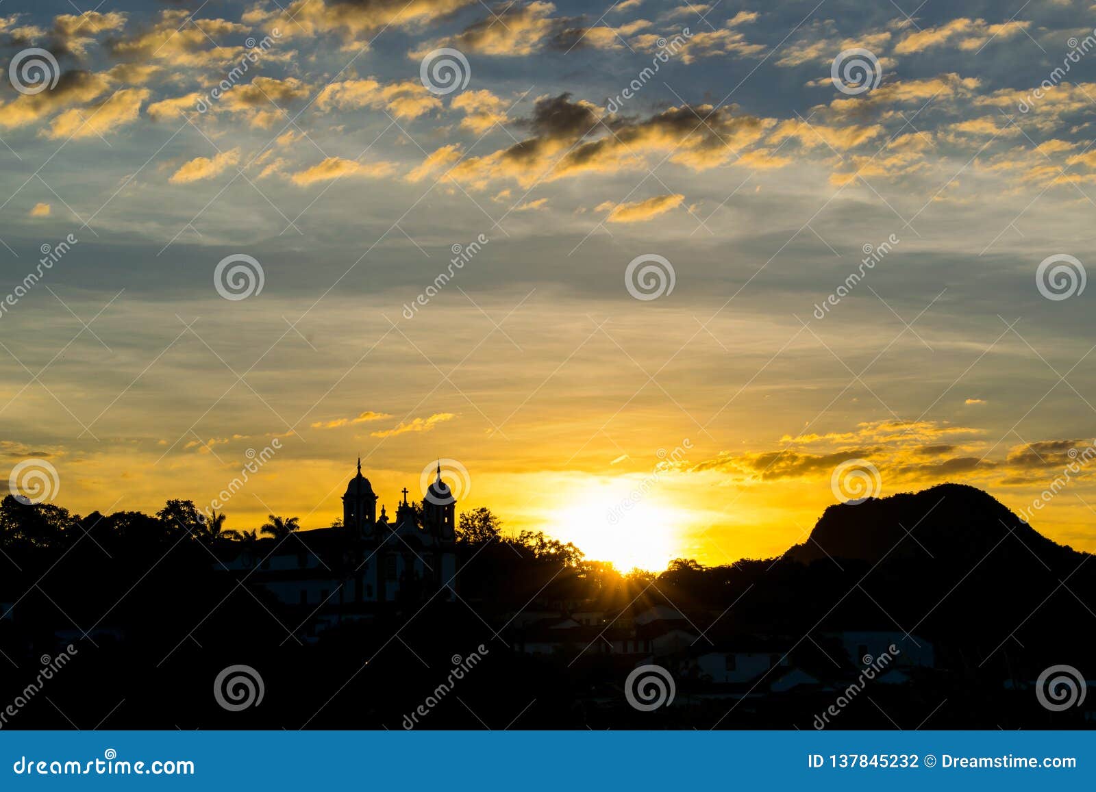 sunset overlooking the church of tiradentes