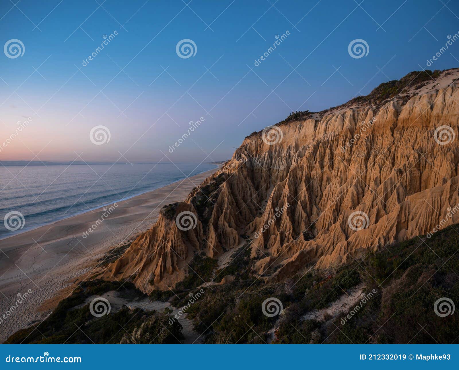 sunset panorama of arriba fossil da praia da gale fontainhas hoodoo fairy chimney earth pyramid rock formation portugal