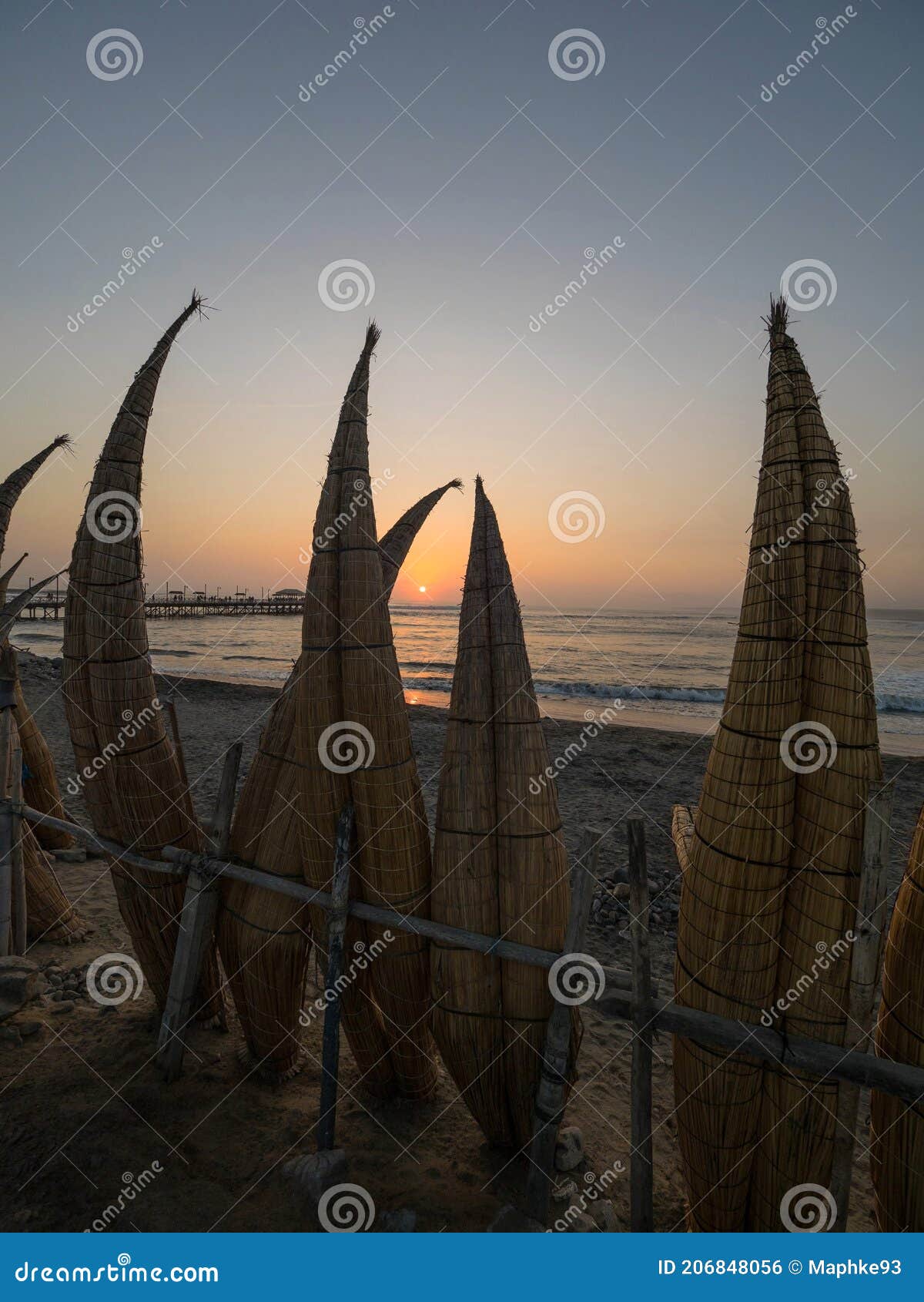 sunset panorama traditional fishing boat caballito de totora reed sedge watercraft huanchaco beach pacific trujillo peru