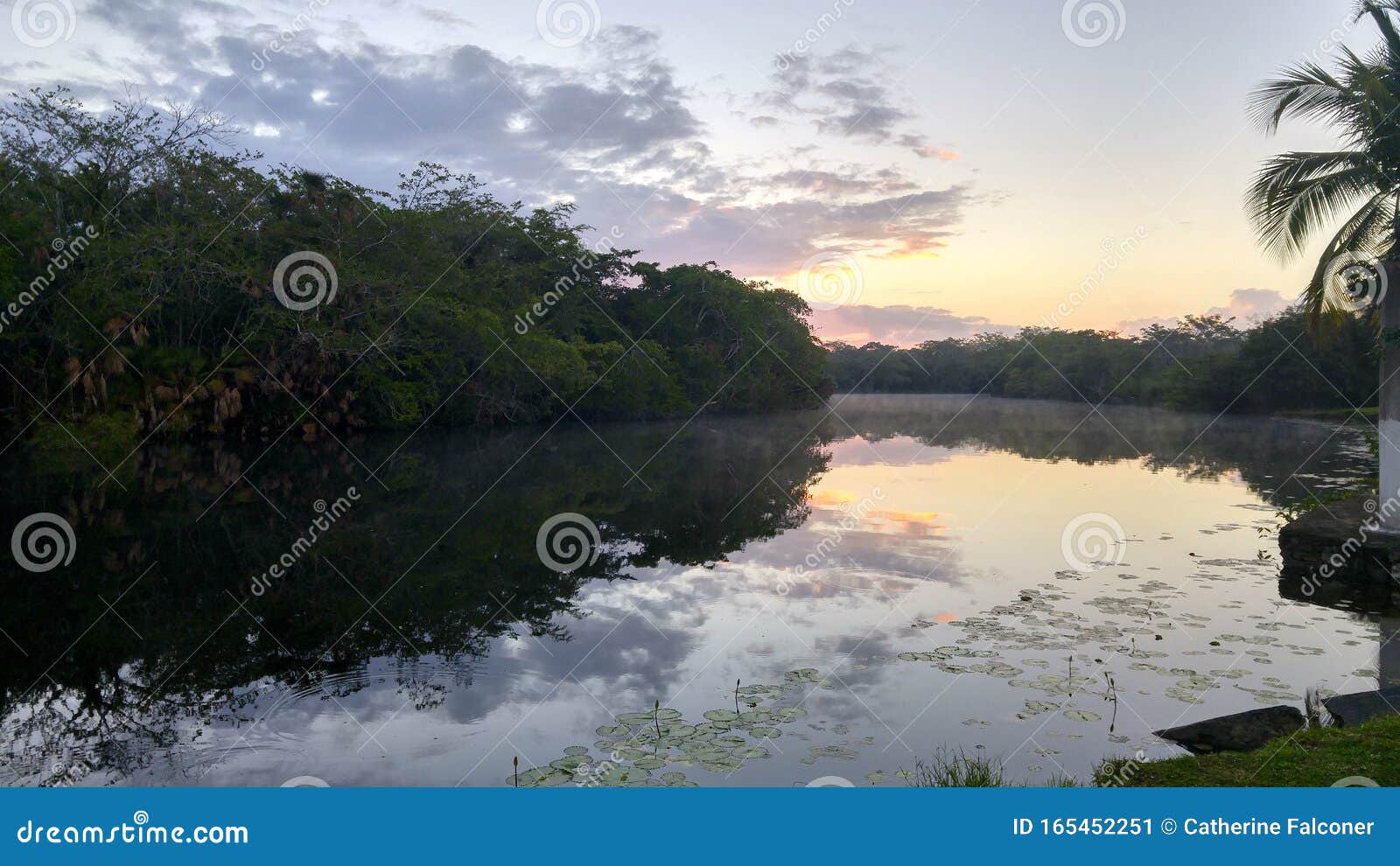 sunset rio nuevo, orange walk, belize