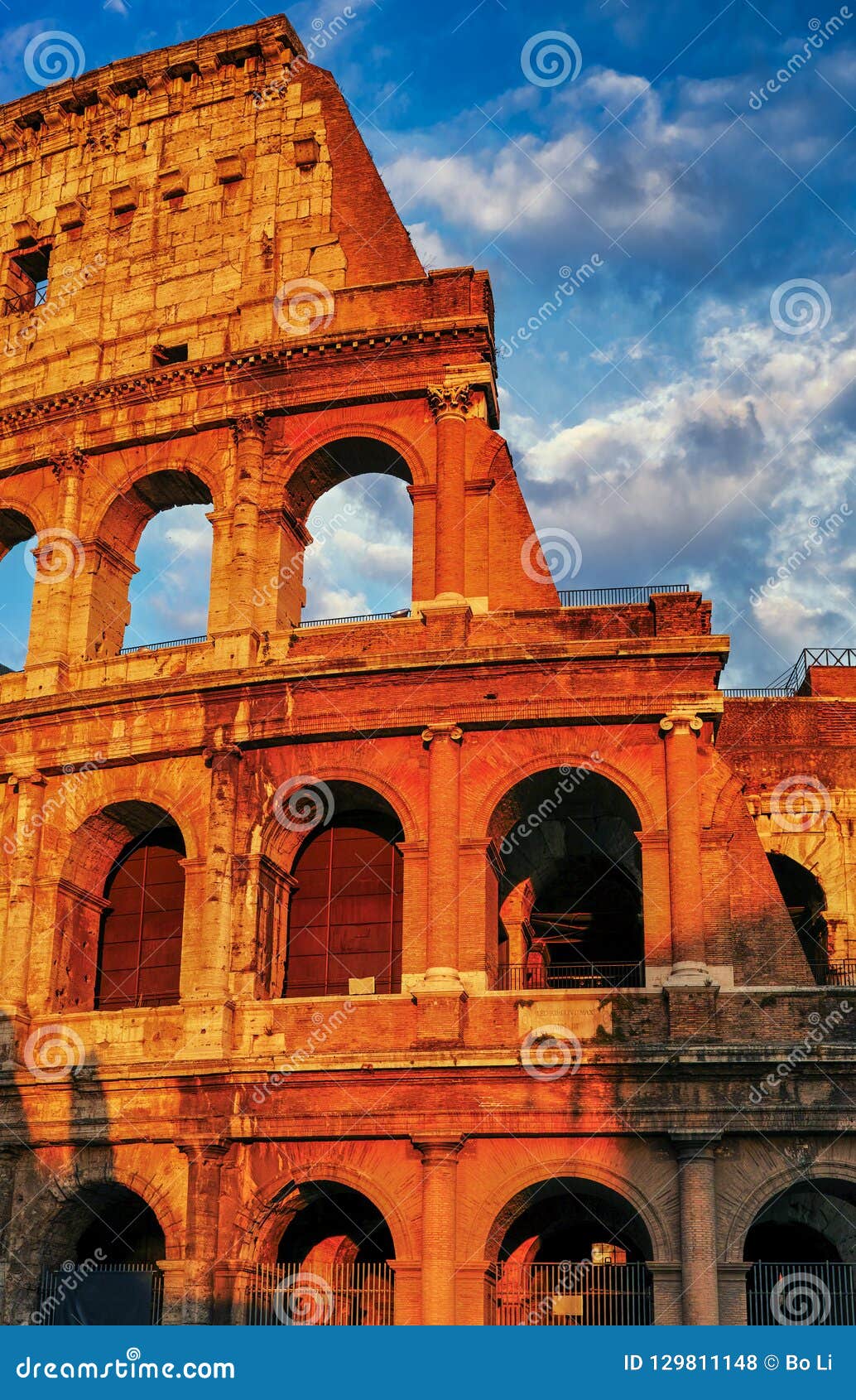 Sunset of Rome Colosseum stock photo. Image of archaeology 129811148