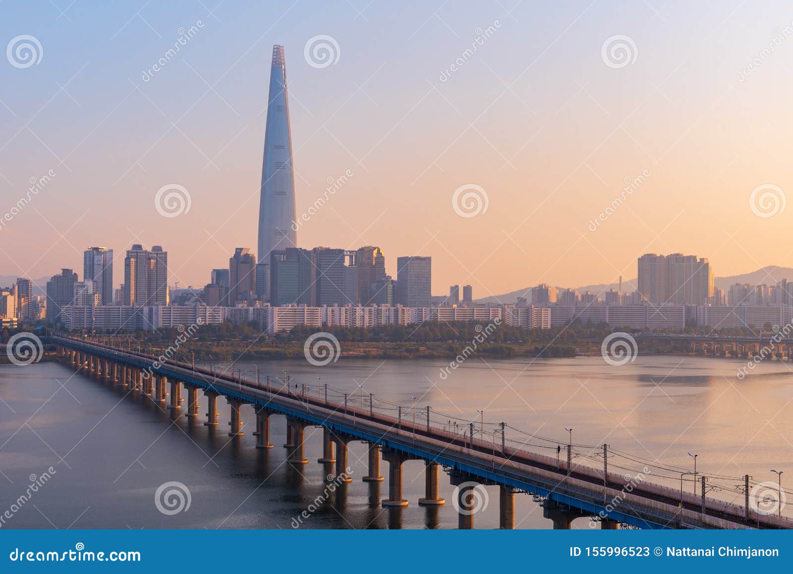 sunset of seoul subway and lotte tower, south korea.