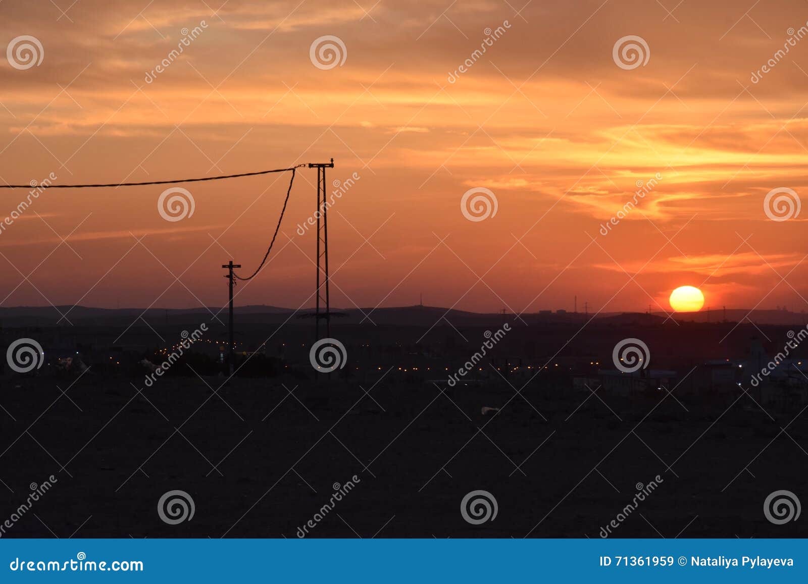 sunset sky over the arar settlement in the negev desert, israel