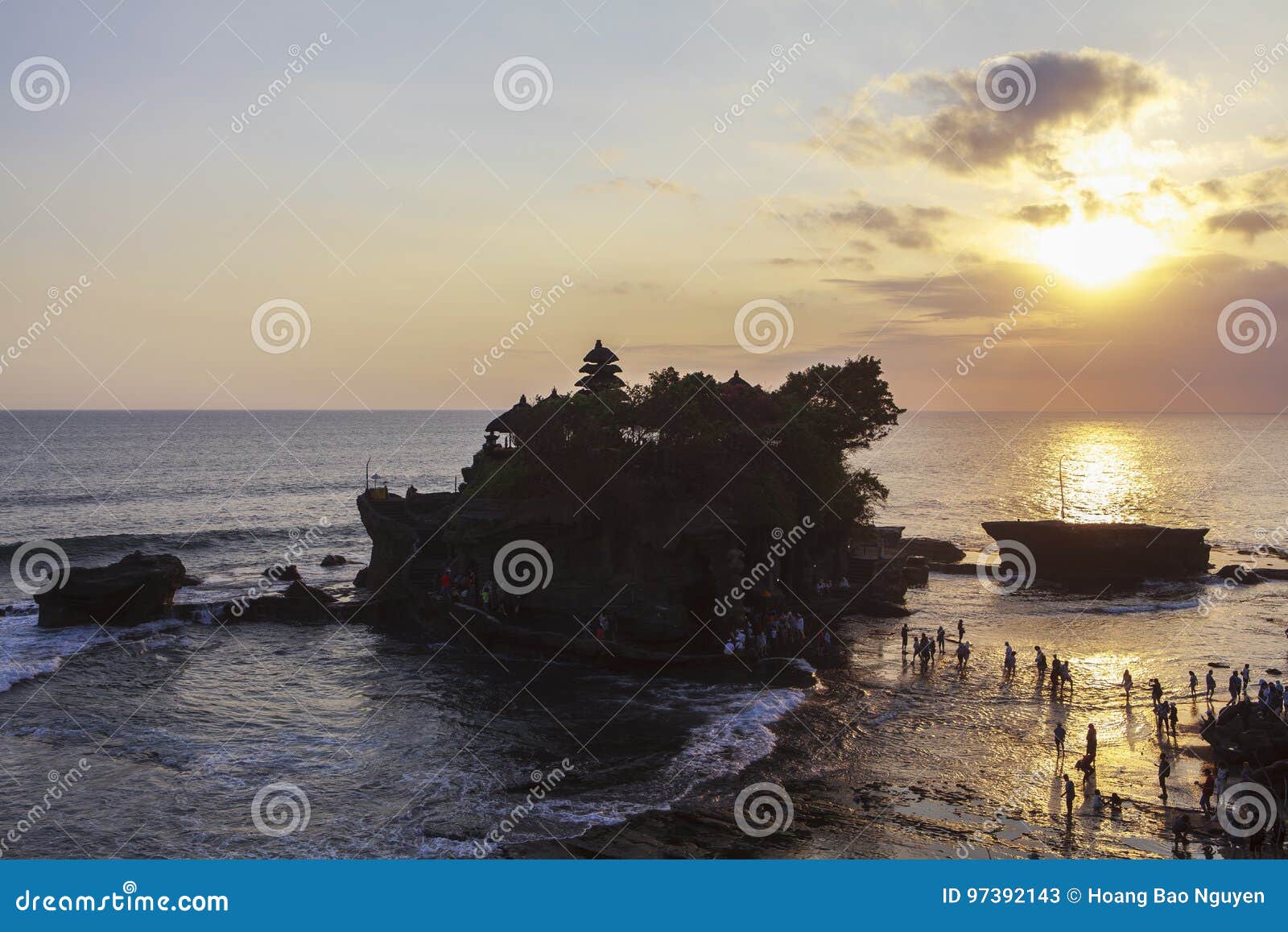 sunset at tanah lot temple in bali