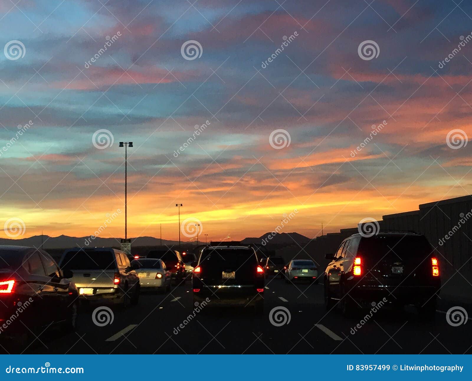 Sunset traffic jam editorial stock image. Image of traffic - 83957499, image size:1600x1290