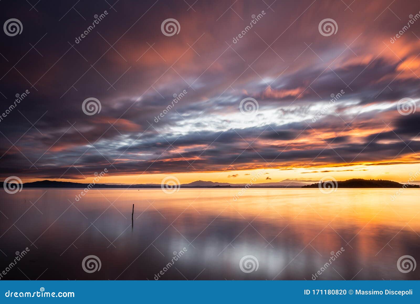 Sunset a Trasimeno Lake Umbria, Italy, with Fishing Net Poles and Branches  on Perfectly Still Water Stock Photo - Image of environment, meditative:  171180820