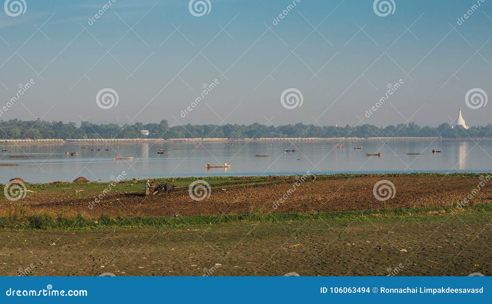 sunset in u bein bridge with vintage boat myanmar. u bein bridge is longest teak