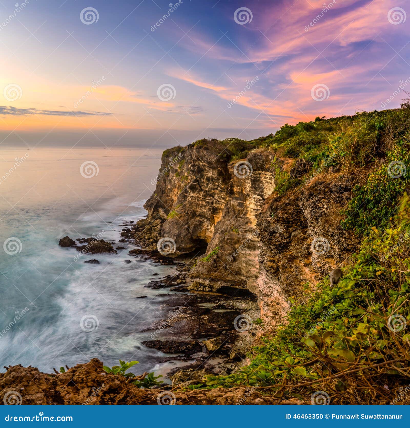Sunset at Uluwatu cliff stock photo. Image of stone, ocean 46463350
