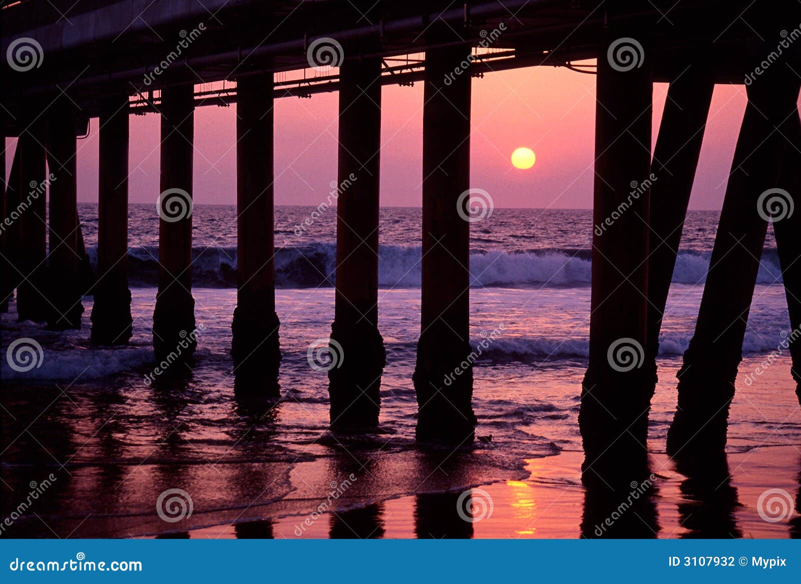 sunset under boardwalk