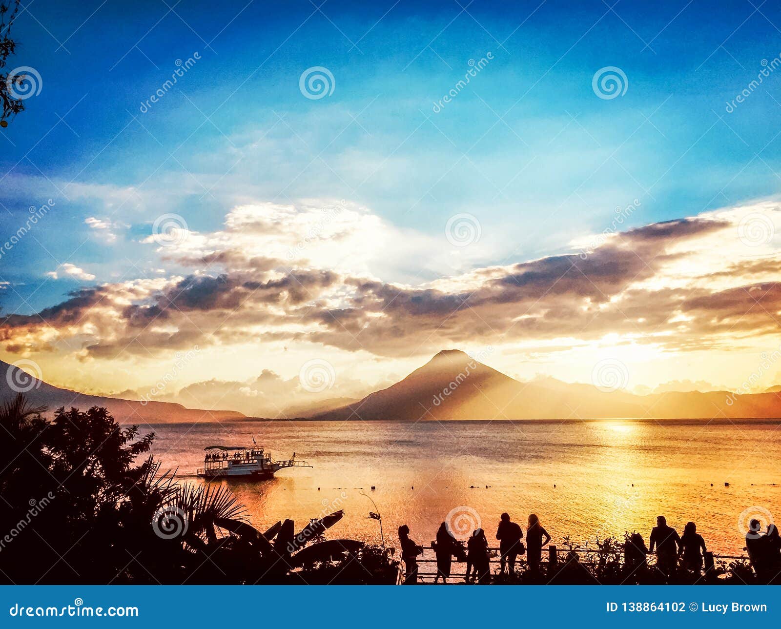 sunset view of lake atitlan & volcano, guatemala, central america