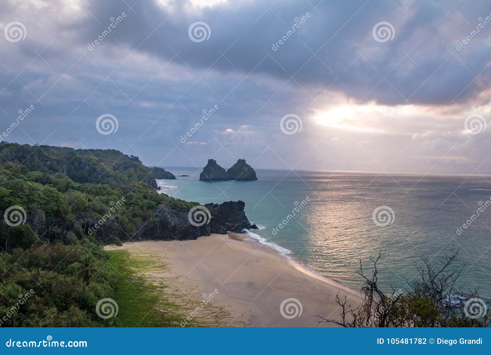 sunset view of morro dois irmaos and praia do americano beach from boldro fortress viewpoint - fernando de noronha, brazil
