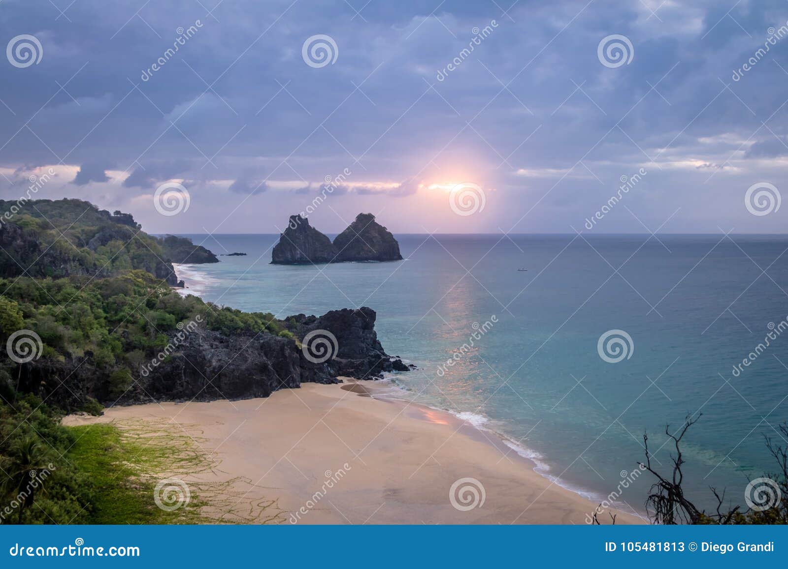 sunset view of morro dois irmaos and praia do americano beach from boldro fortress viewpoint - fernando de noronha, brazil