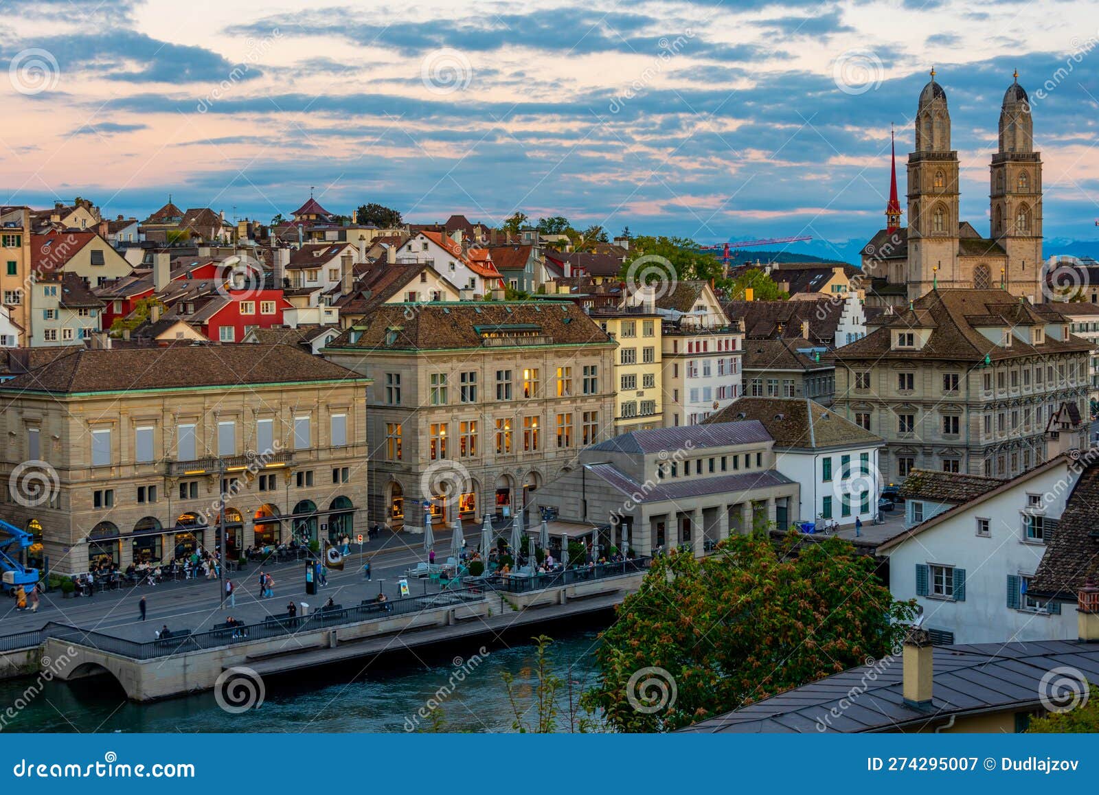 Sunset View of Quay of River Limmat in Zuerich Dominated by the Stock