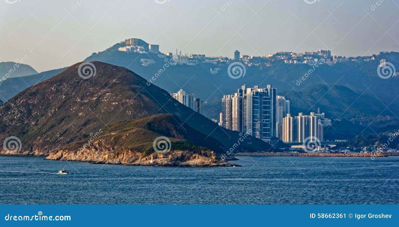 sunset view to residential apartments building in hong kong seaf