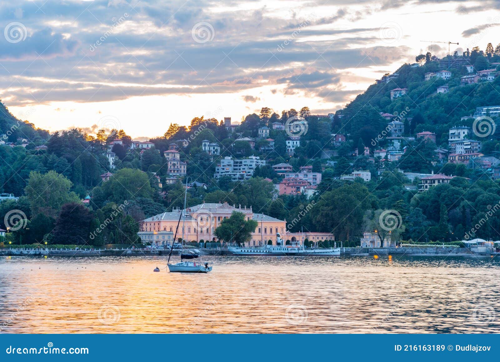 sunset view of villa olmo situated on shore of lago di como in italy