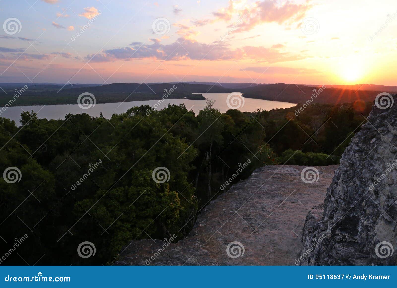 sunset at yaxha, mayan pyramid in guatemala