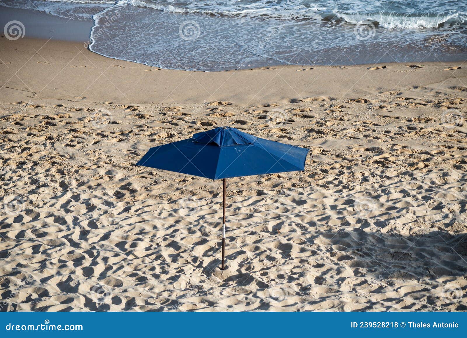 sunshade on the beach in the strong sun of the day