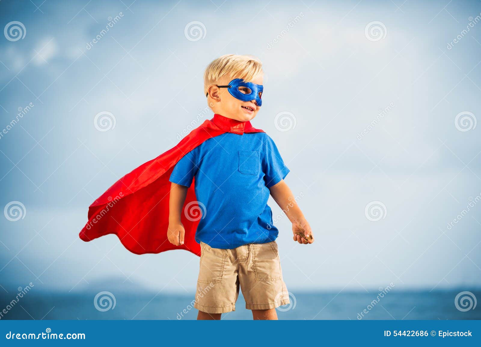 super hero kid with a mask flying