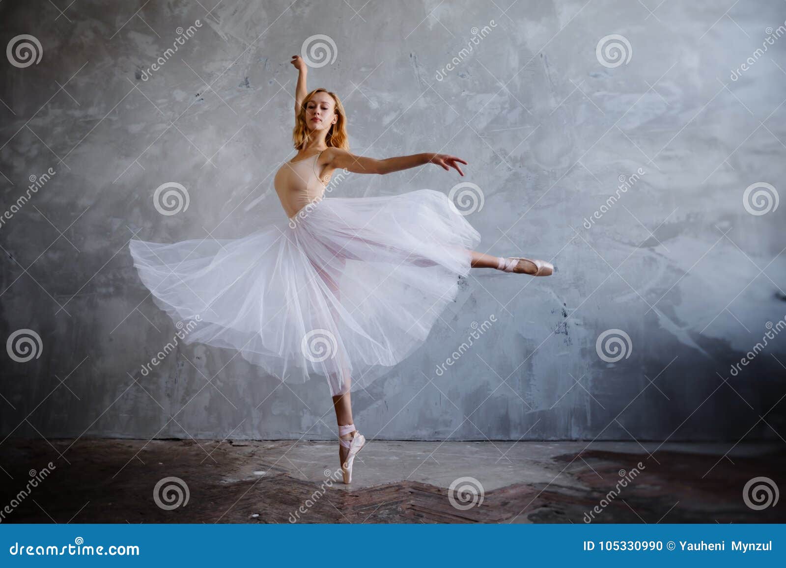 Super Slim Ballerina in a Black Dress is Posing in the Studio Stock ...