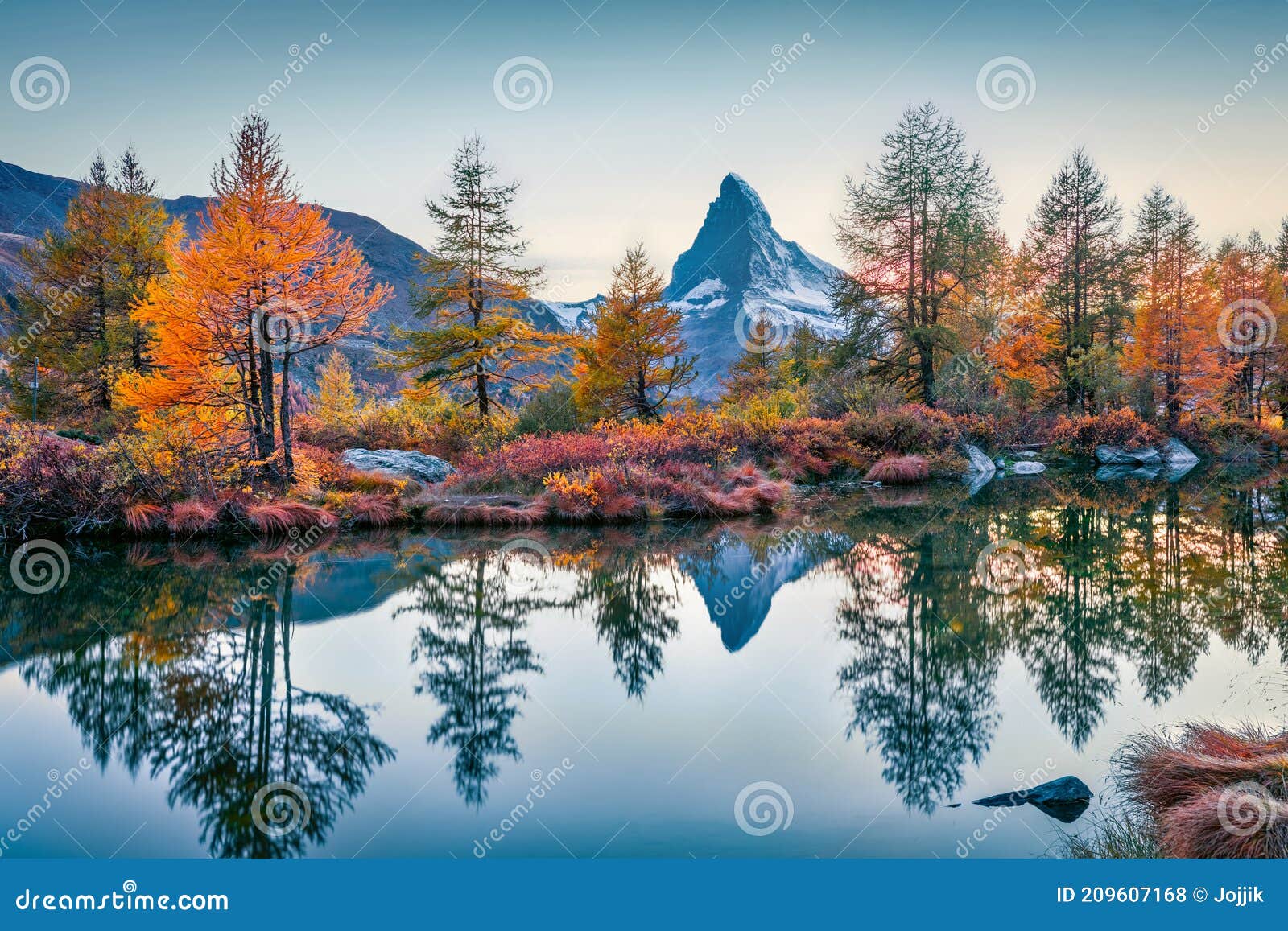 superb autumn view of matterhorn cervino peak. wonderful morning scene of grindjisee lake, swiss alps, zermatt resort location,
