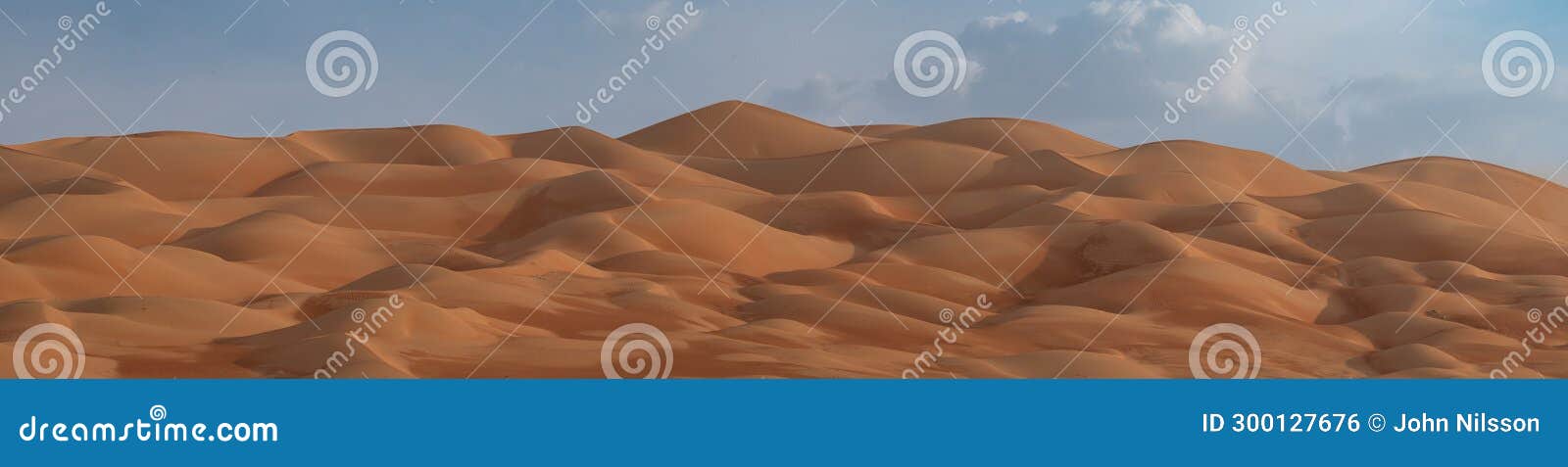superb panorama of rounded sand dunes in the rub al khali desert, arabian peninsula