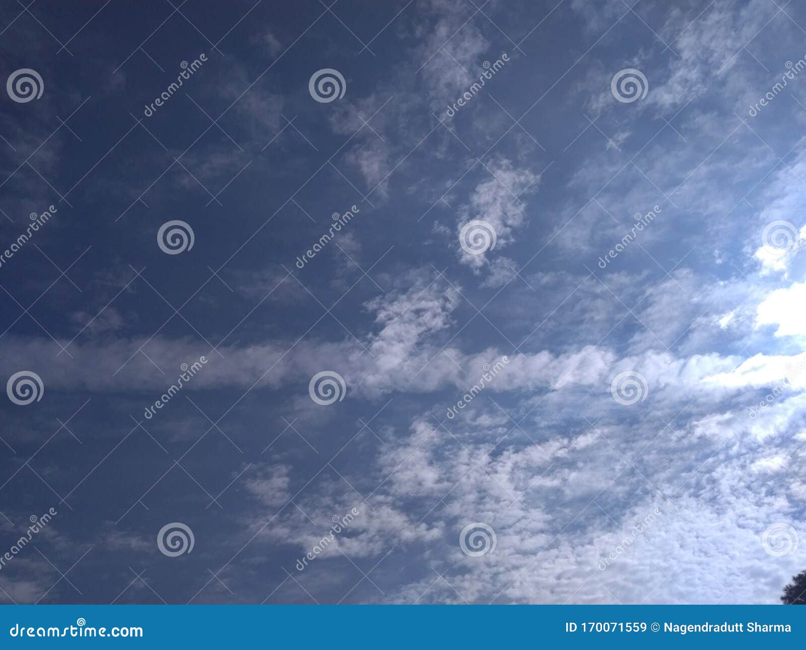a superb snapshot of a fetching view of an unusual pattern of some clusters of white clouds
