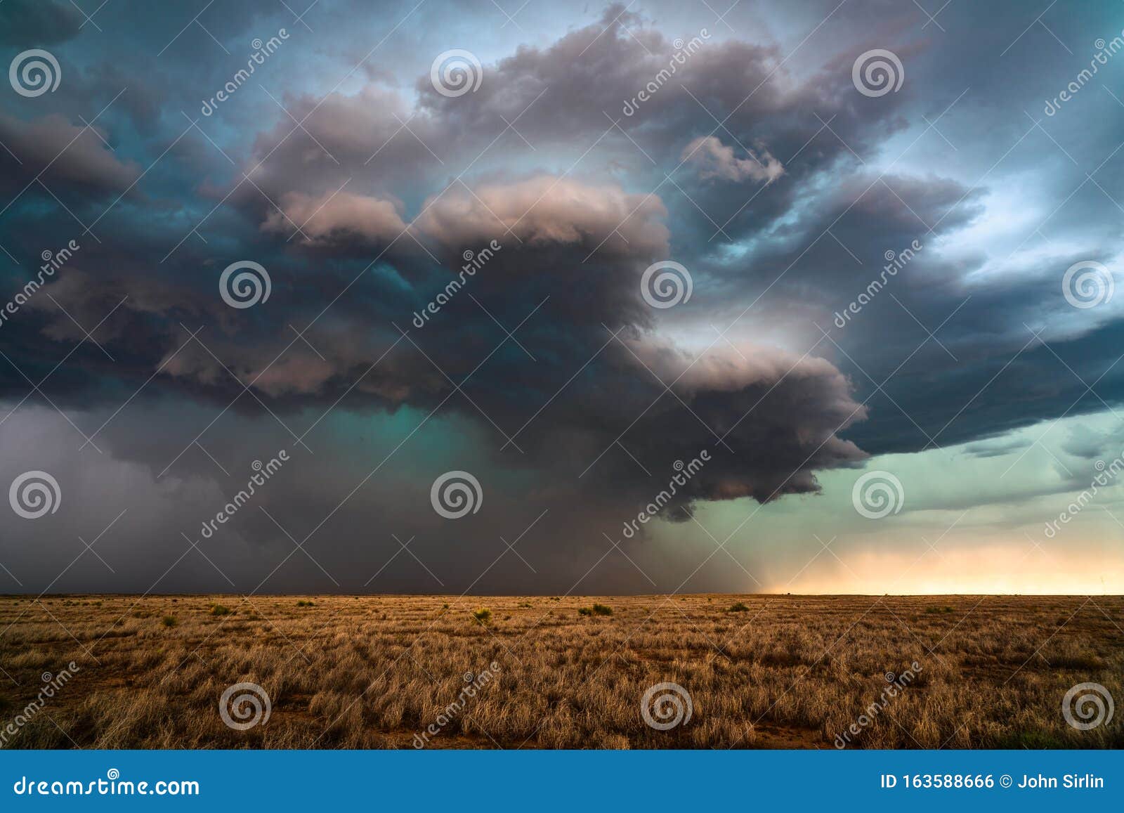 supercell thunderstorm with dark clouds and dramatic sky