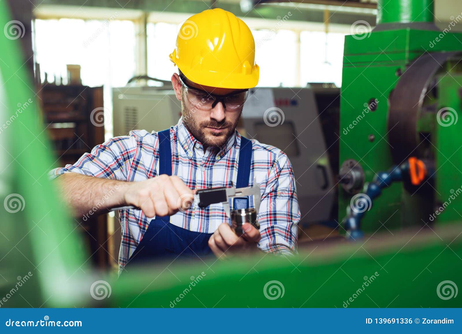 Supervisor Doing Quality Control and Production Check in Factory Stock