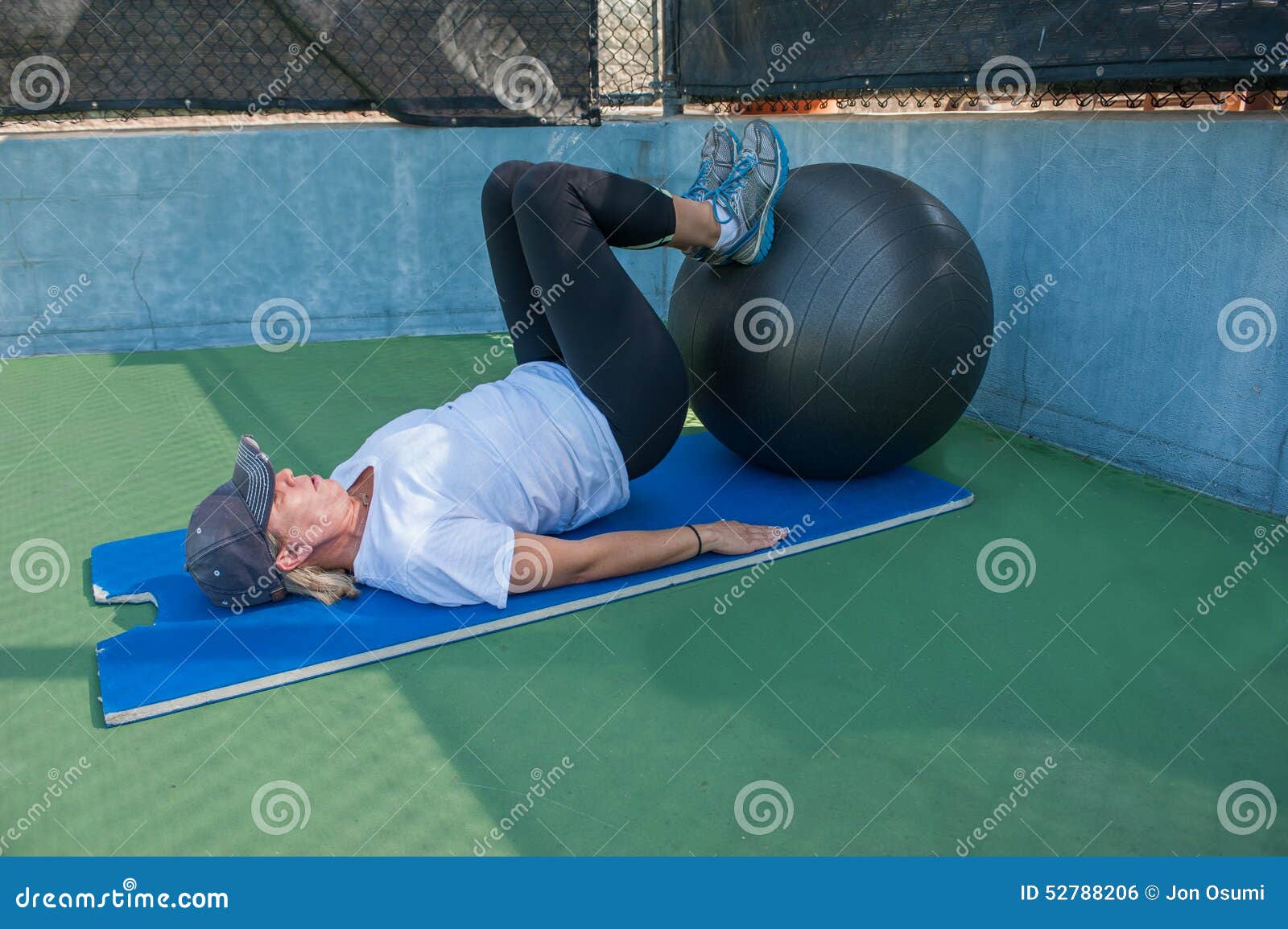Supine leg curl exercise stock photo. Image of health 52788206