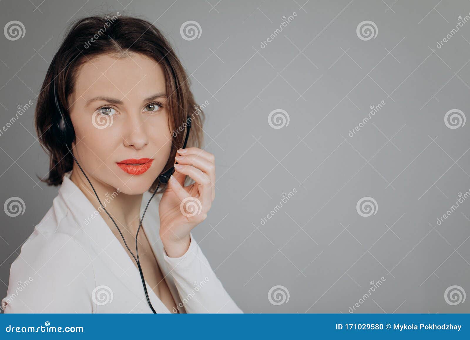 Support Phone Operator in Headset Using Personal Computer. Agent Woman ...