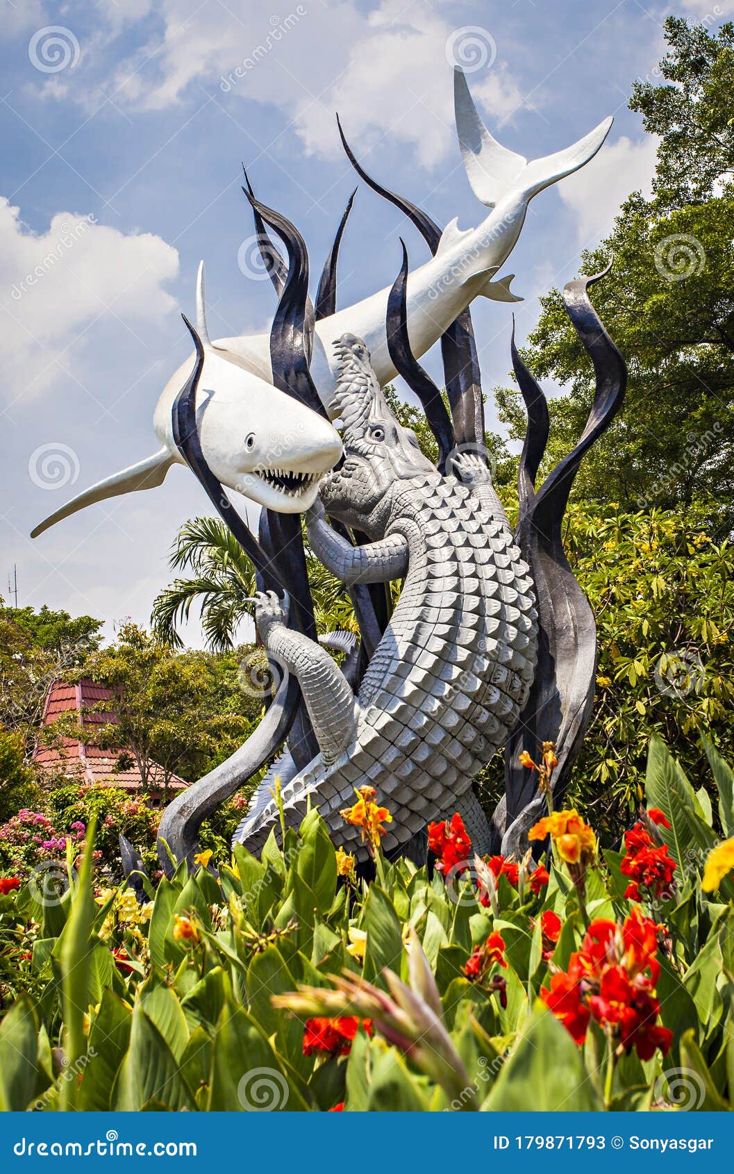 Surabaya monument, famous landmark of Surabaya City, Indonesia. Surabaya monument, famous landmark of the city, the Monument showed `the shark and the crocodile fight` as the symbol of Surabaya.