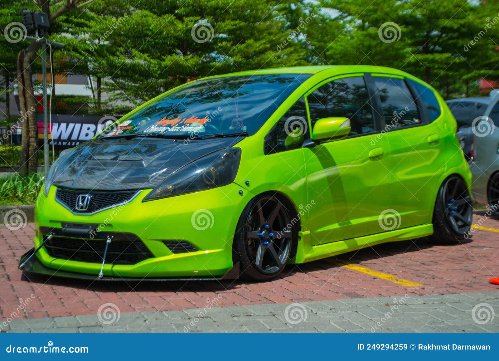 Modified Green Honda Jazz or Honda Fit in Car Show Editorial Stock