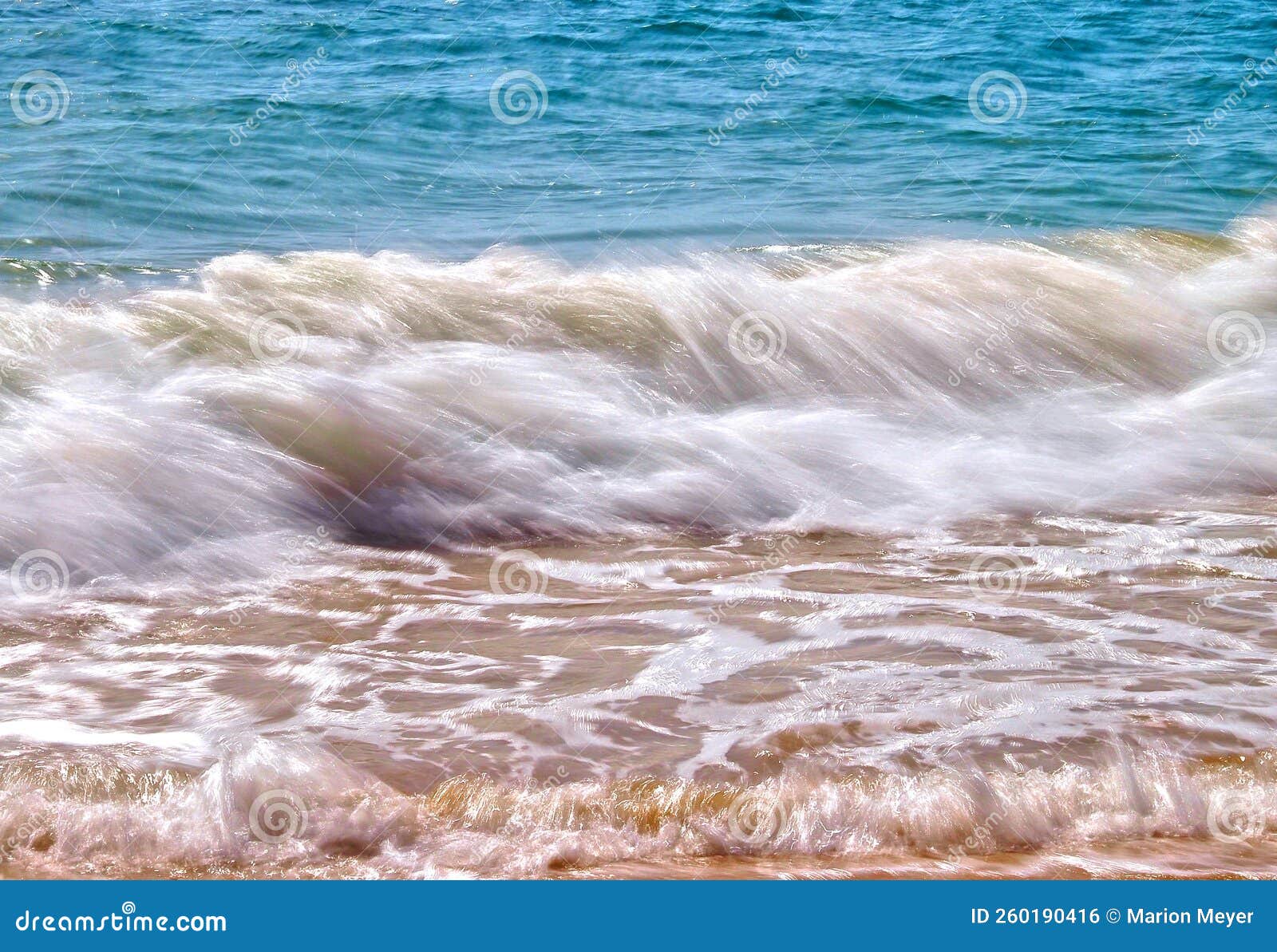 Surf from the Sea on the Beach in Slow Soft Motion Stock Photo Image