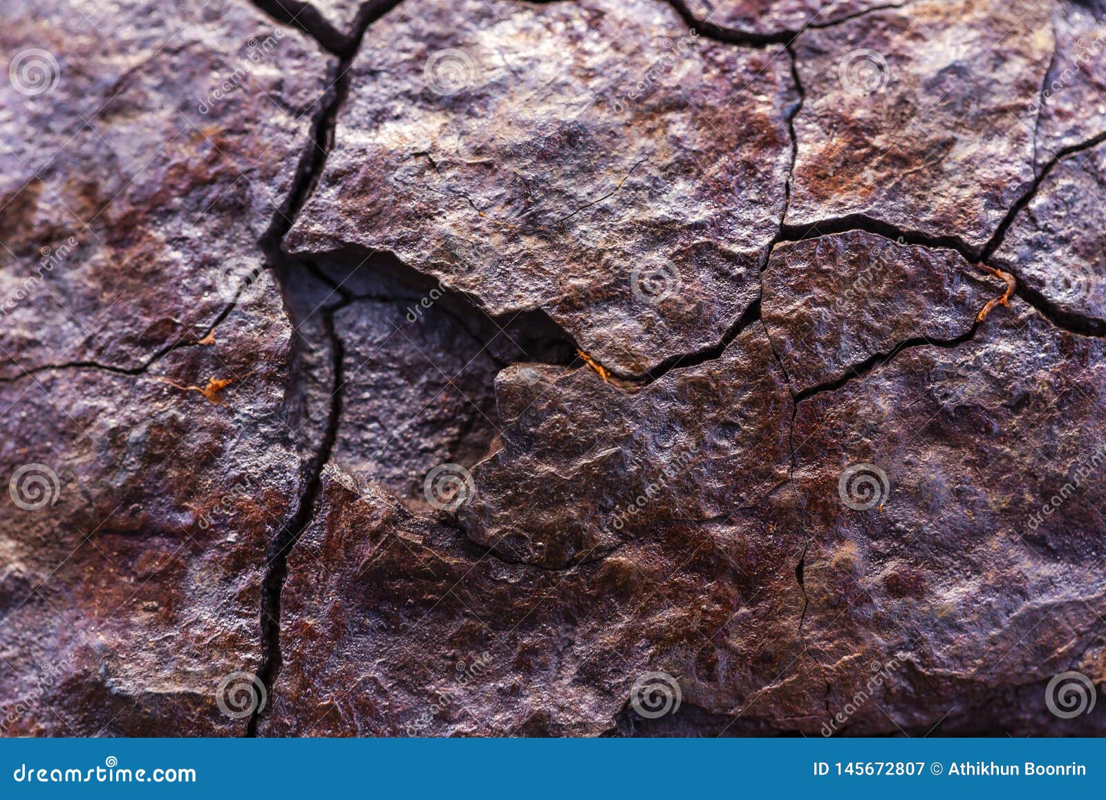 the surface of the broken metal rusts naturally.
