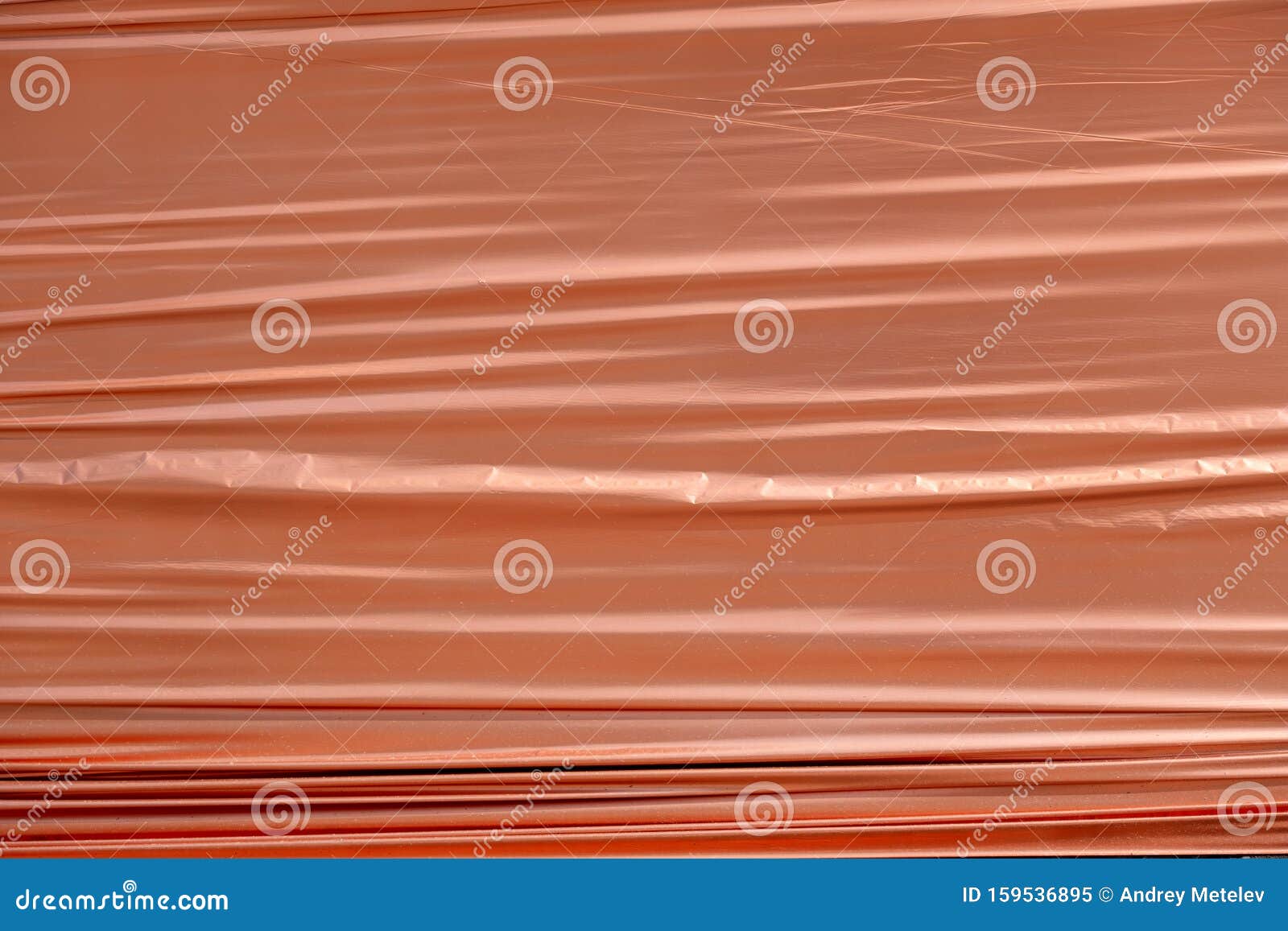 The Surface is Shiny Copper Color with Waves and Tints Stock Image