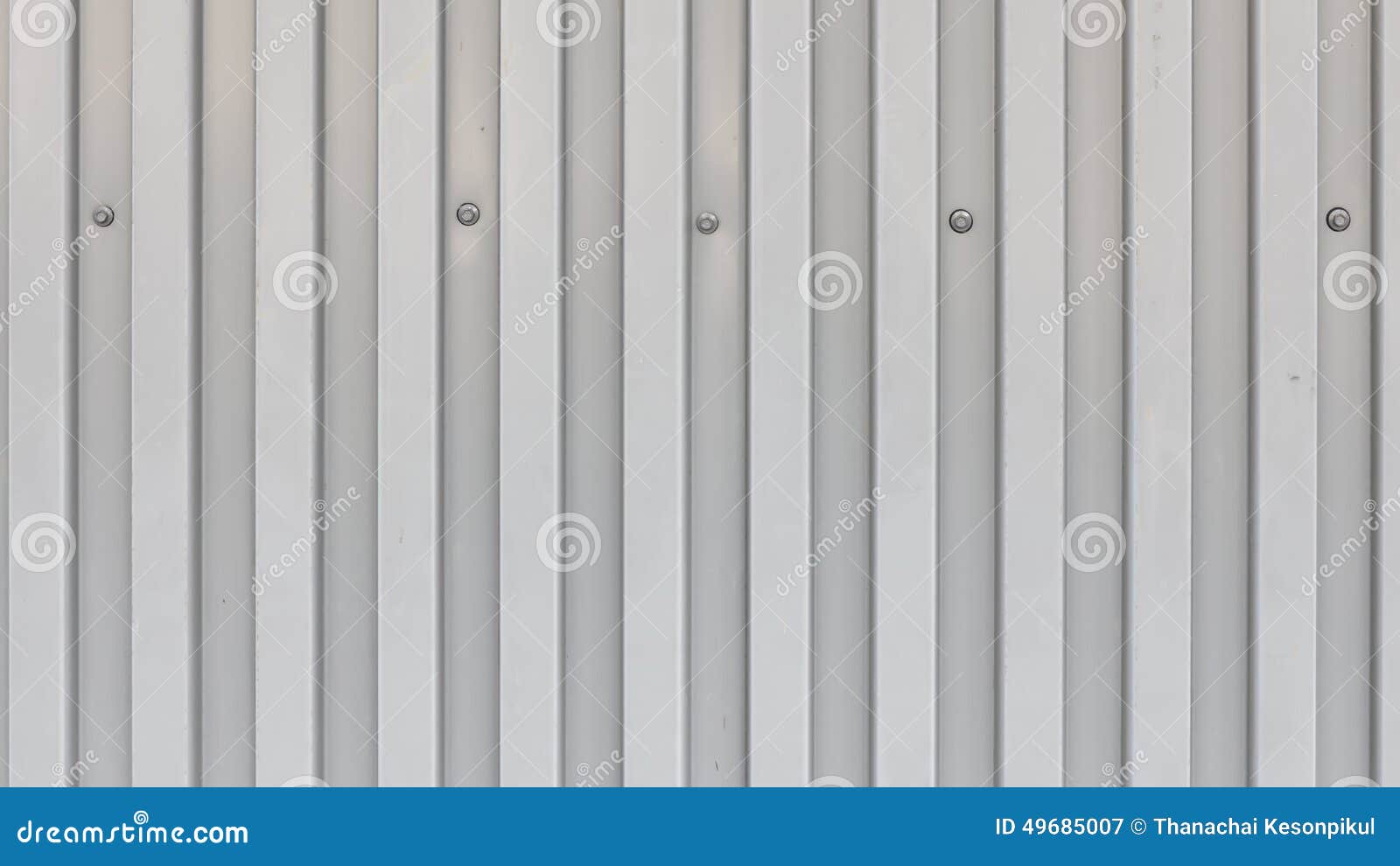 surface of trapezoidal metal sheet with bolts