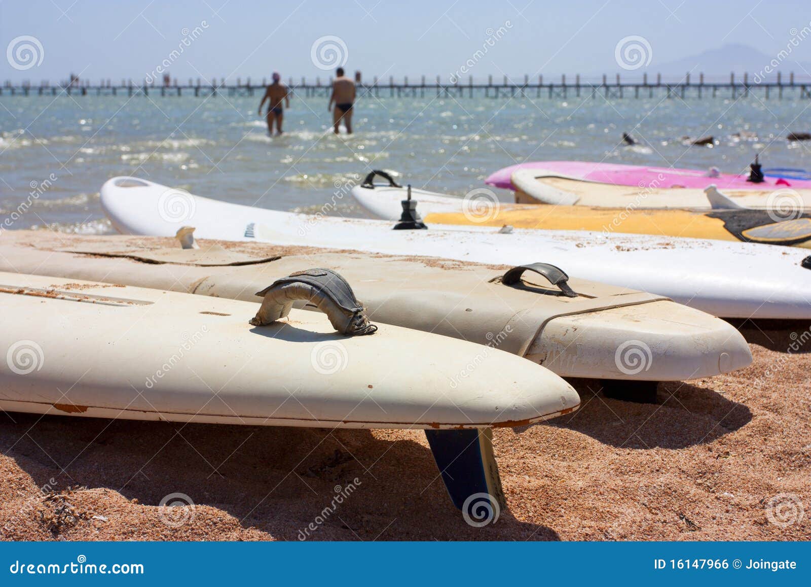Surfboards on the beach stock photo. Image of group, boards 16147966