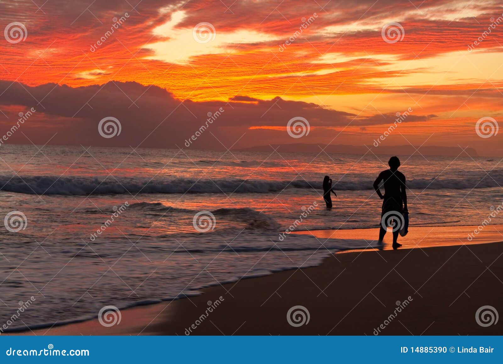 surfer - beach sunset - kauai, hawaii