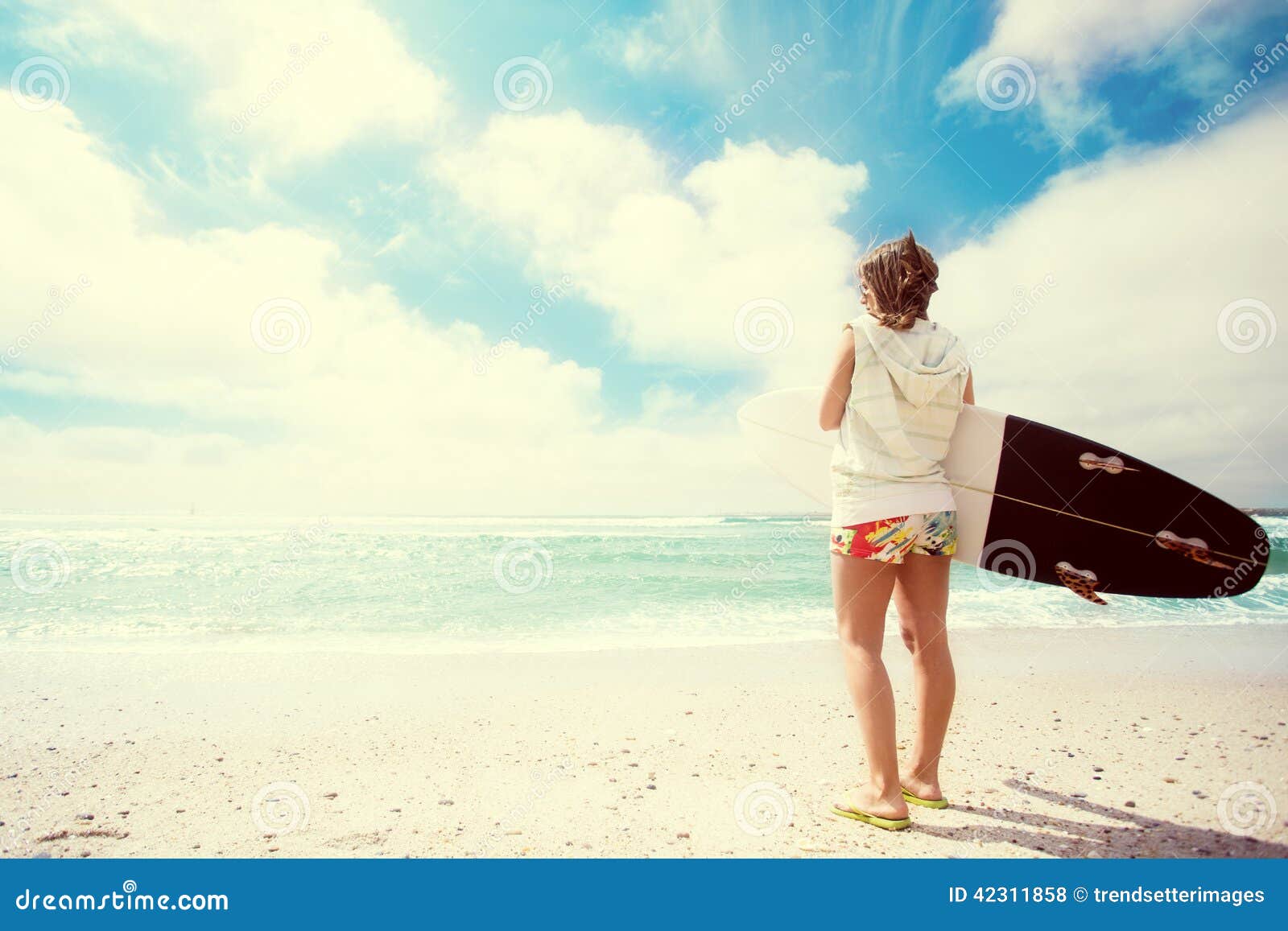 Surfer girl on the beach stock photo. Image of sporty 42311858