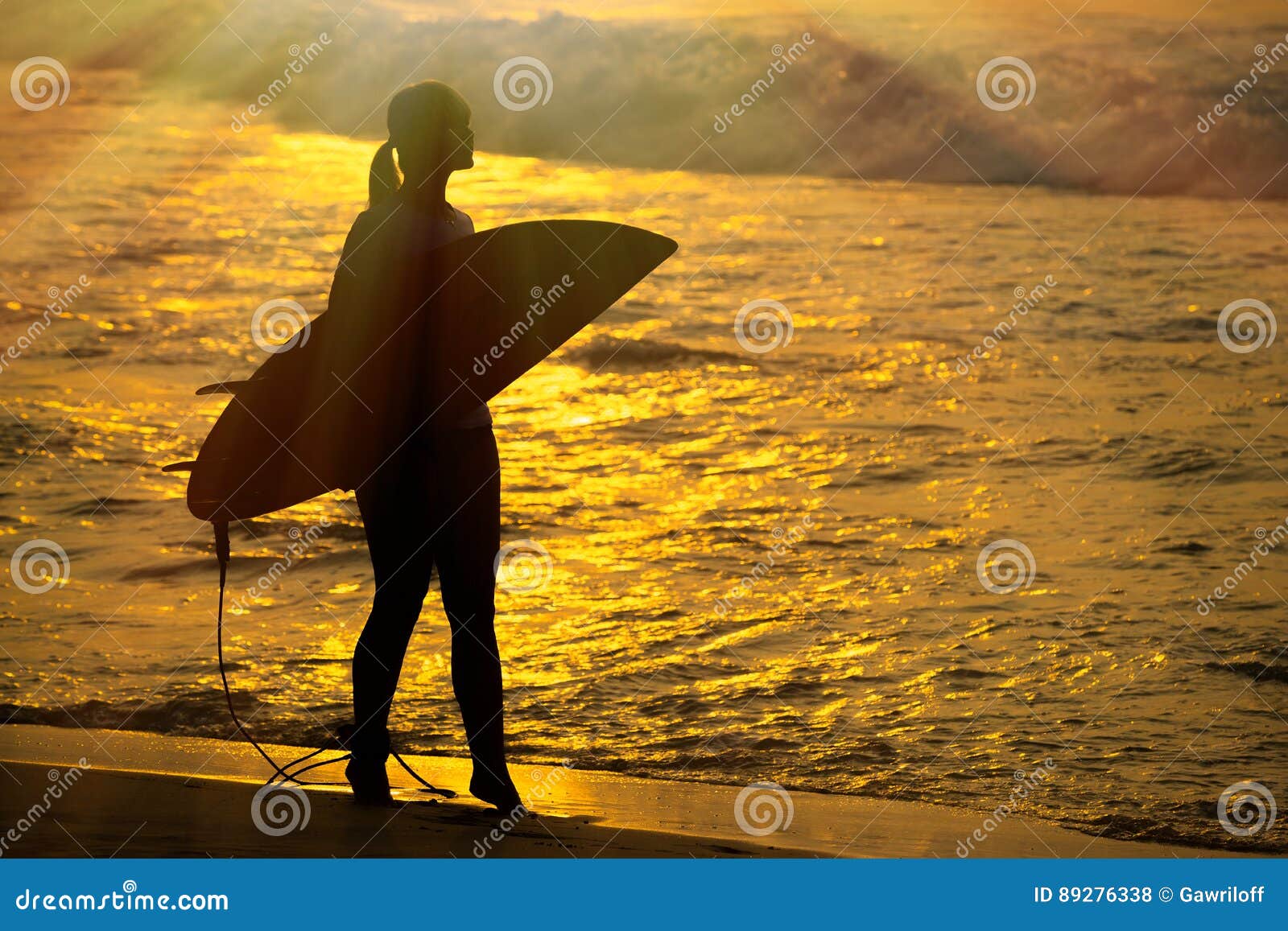 Surfer Girl Surfing Looking at Ocean Beach Sunset. Silhouette W Stock ...