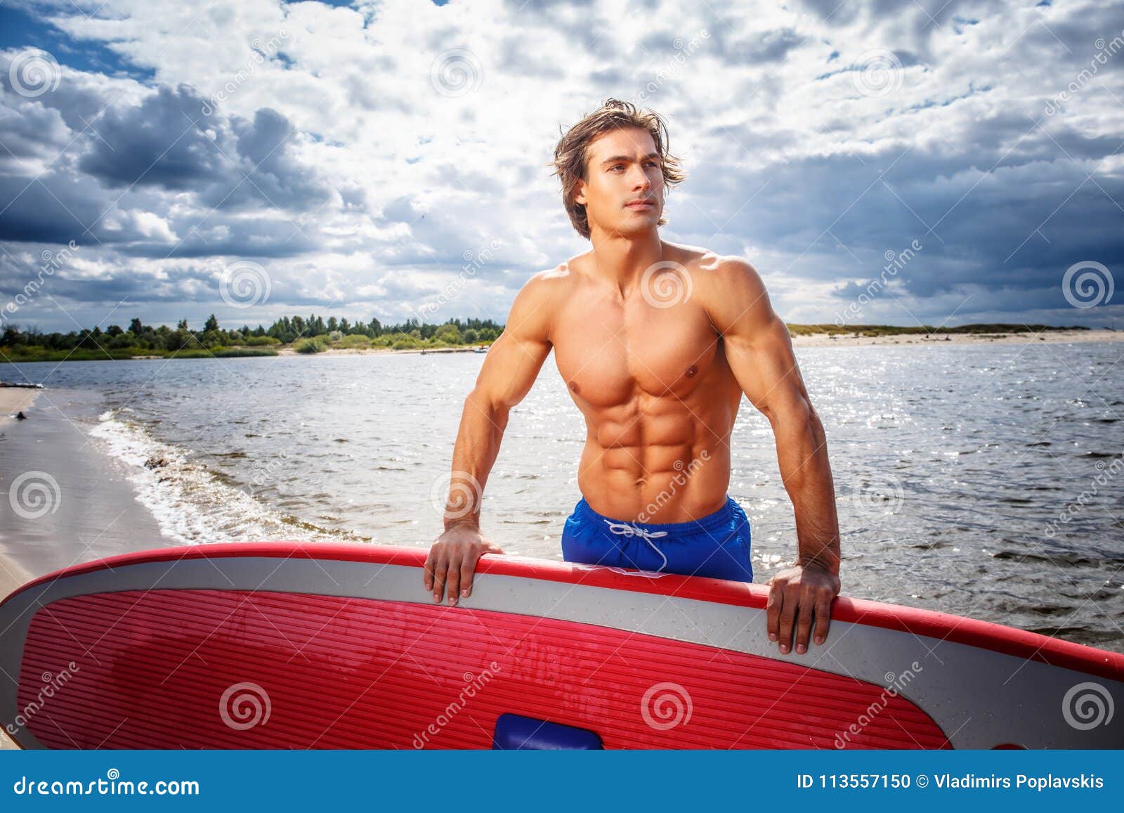 Fitness Male Model In White Pants And Shirtless Posing On 