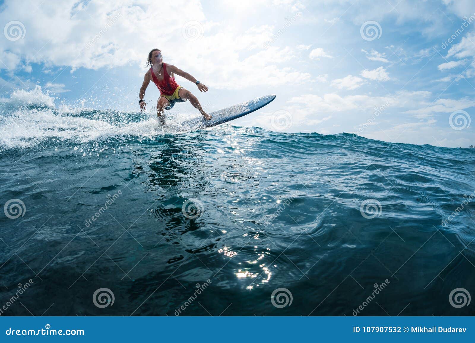 Surfer rides the wave stock photo. Image of alone, glide - 107907532