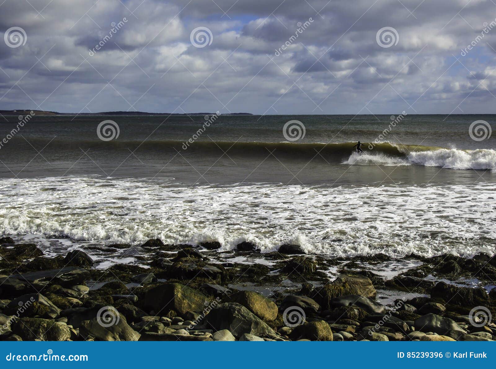 Surfer Surfs a Perfect Wave on a Sunny Day Stock Photo Image of