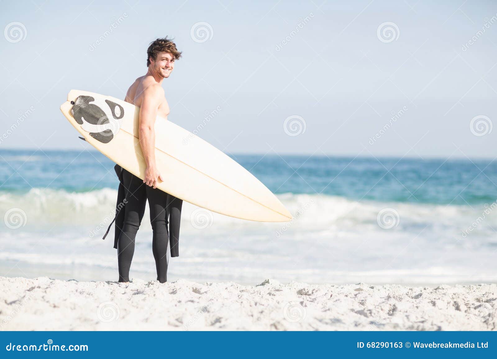 Surfer Walking on the Beach with a Surfboard Stock Image - Image of ...